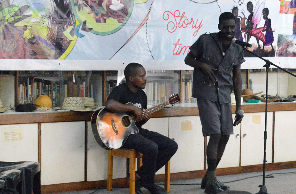 Slider Image A singer is accompanied by a guitarist. Storytelling Day included many artforms, not just folktales.