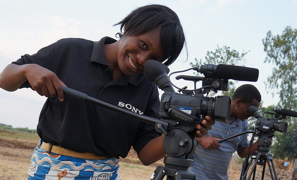 Slider Image Chimwemwe Sumani, an employee of the National Library Service, was part of the technical team that filmed and edited the folktale performances around the country.
